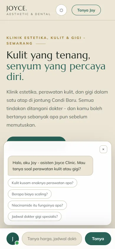 Jendela asisten AI Joy di HP: sapaan Joy dan tombol pertanyaan cepat seperti “Kulit kusam enaknya perawatan apa?” dan “Jadwal dokter gigi spesialis?”.